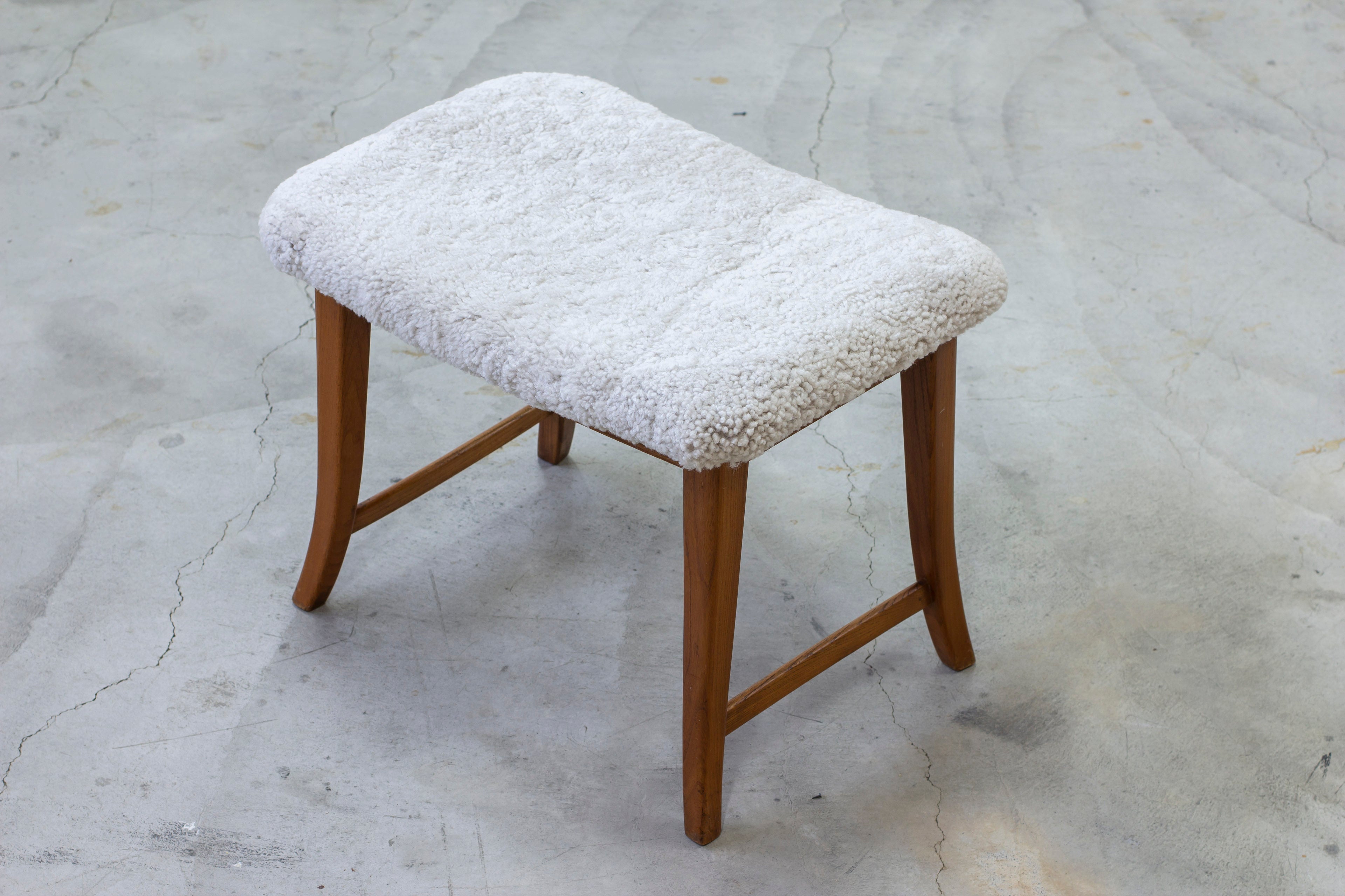 Swedish modern stools with sheepskin