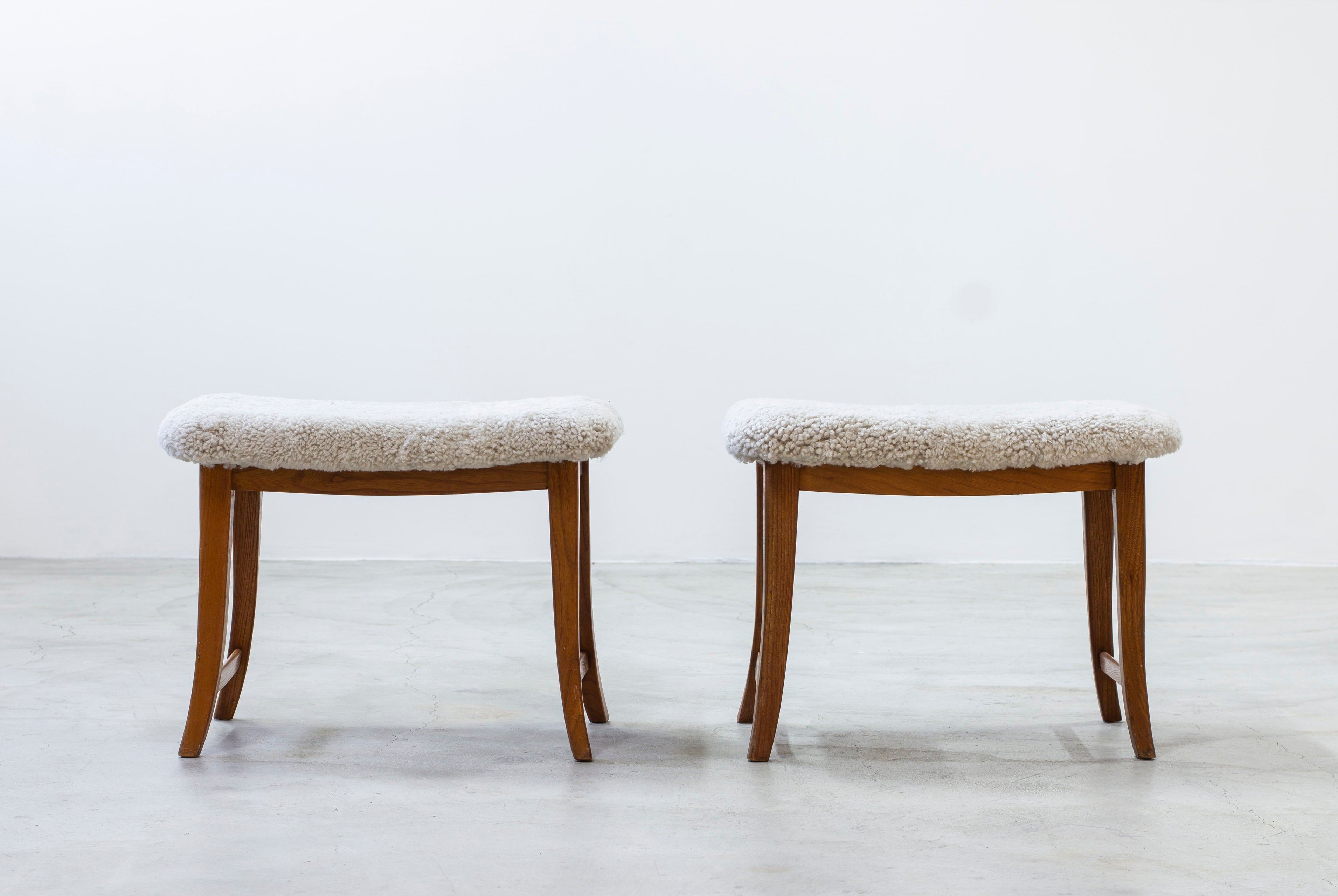 Swedish modern stools with sheepskin