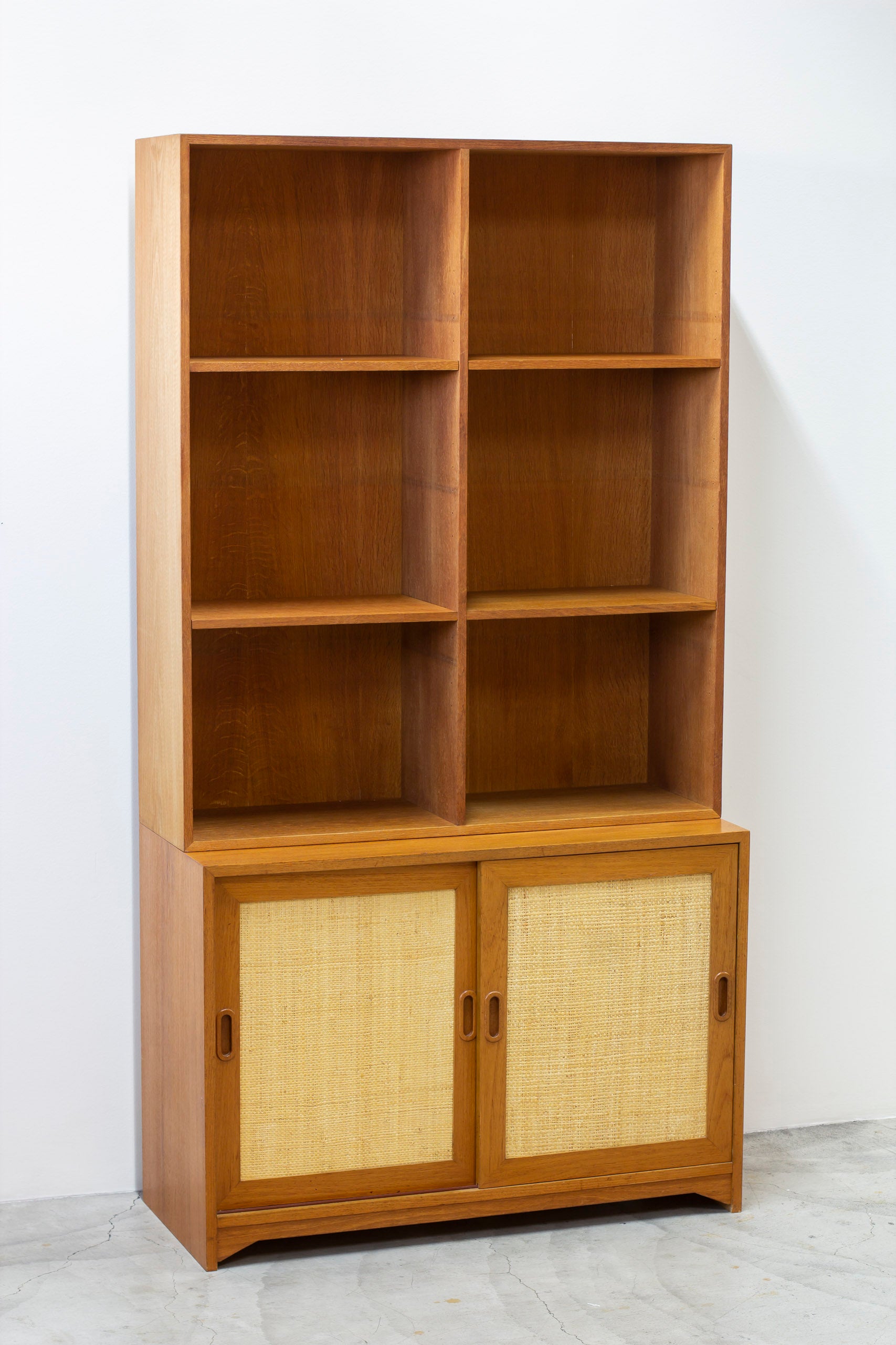 Bookshelf with rattan by Alf Svensson