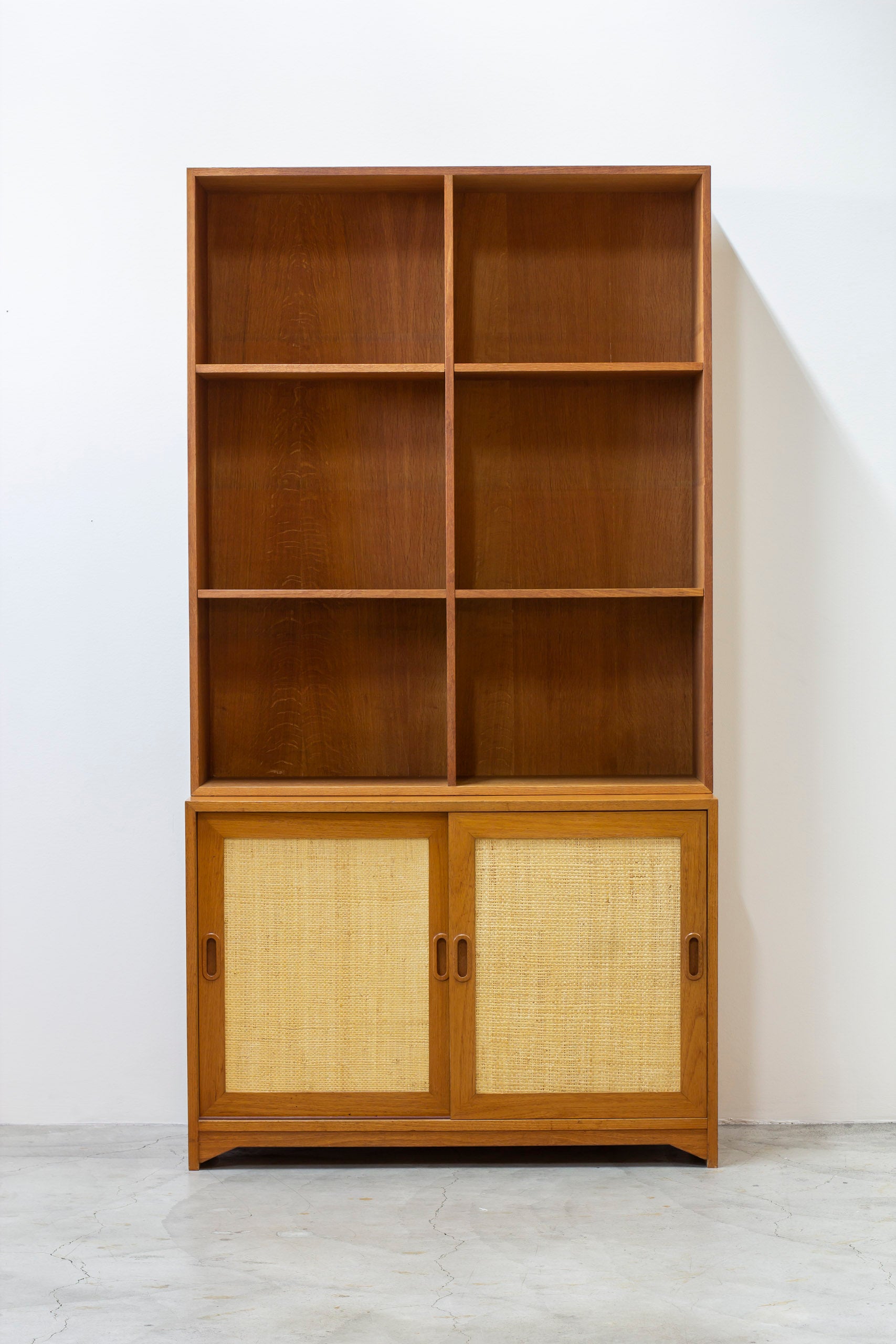 Bookshelf with rattan by Alf Svensson