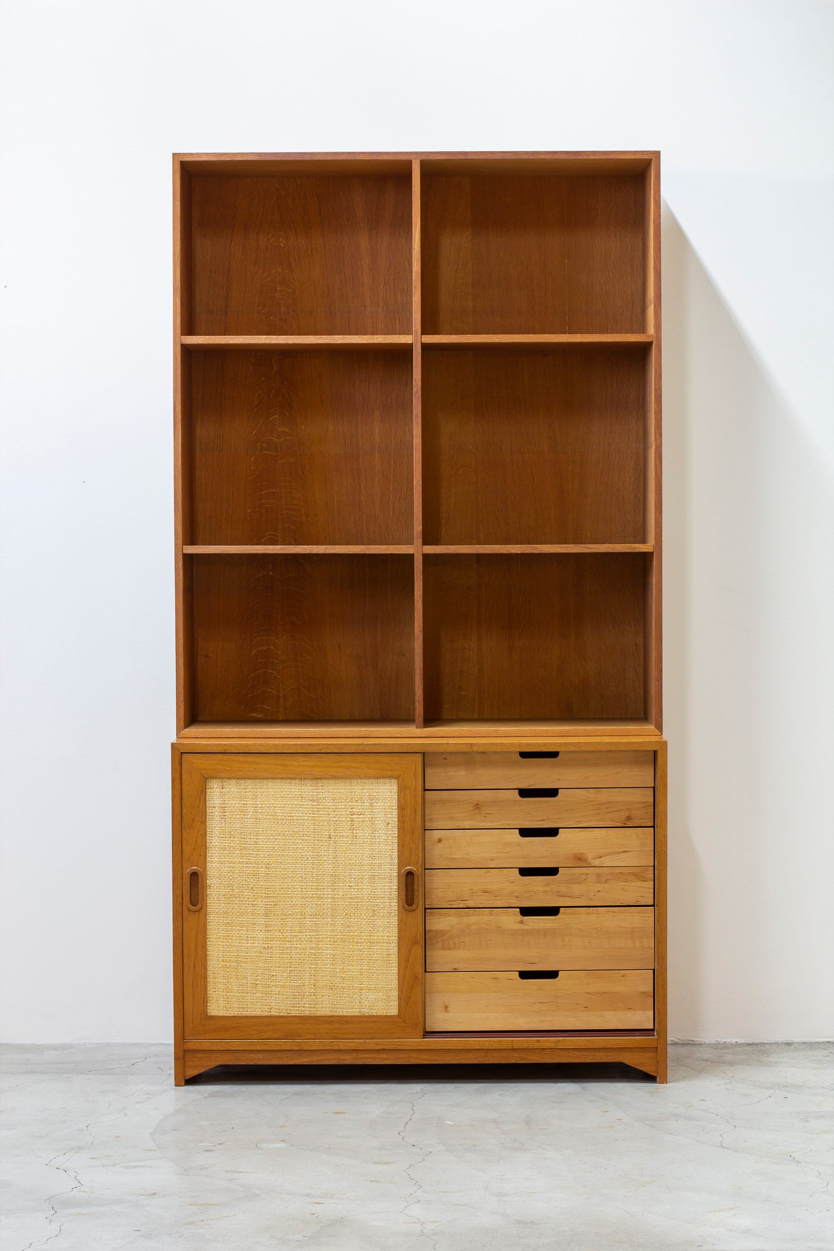 Bookshelf with rattan by Alf Svensson