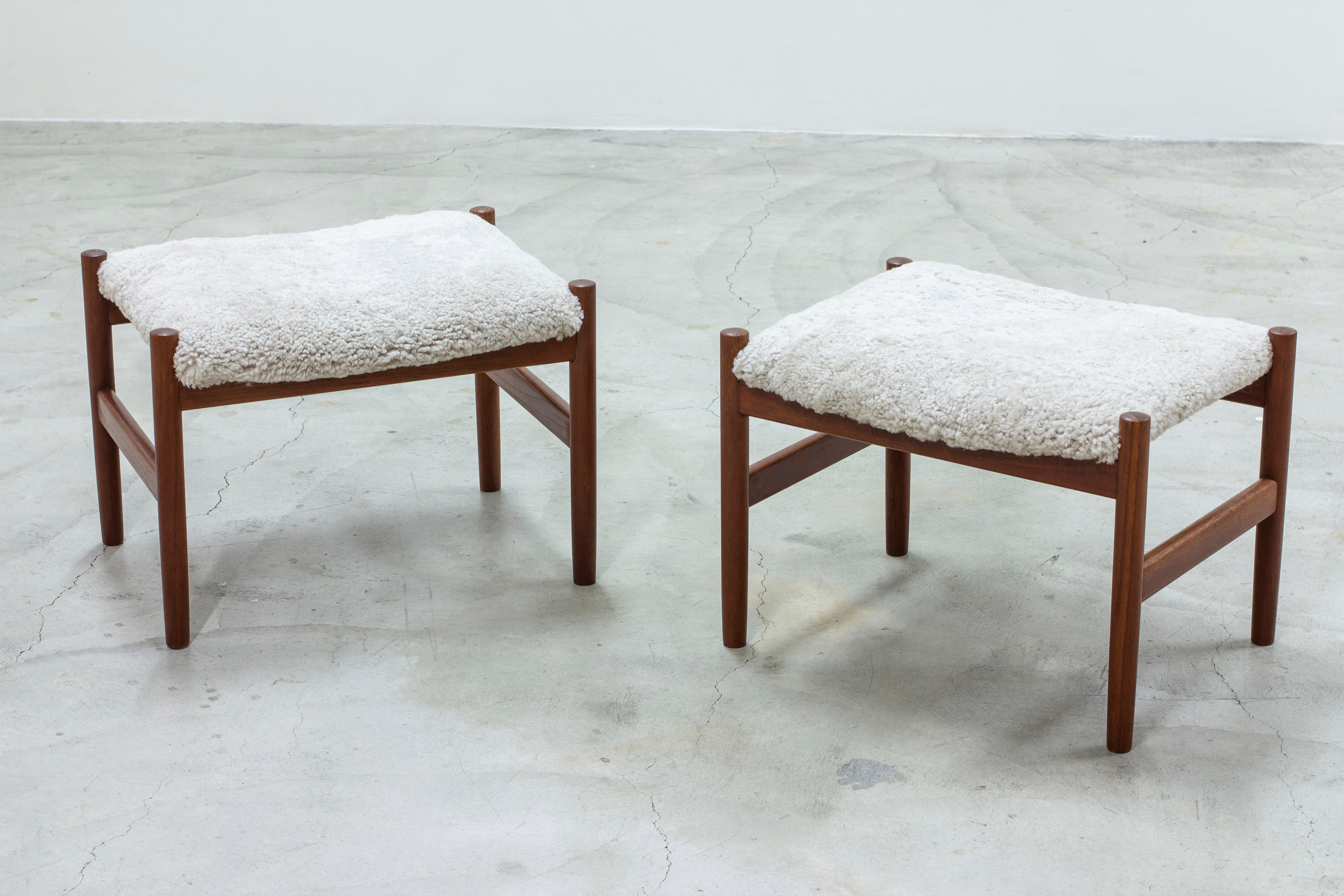 Pair of stools with sheepskin by Hugo Frandsen