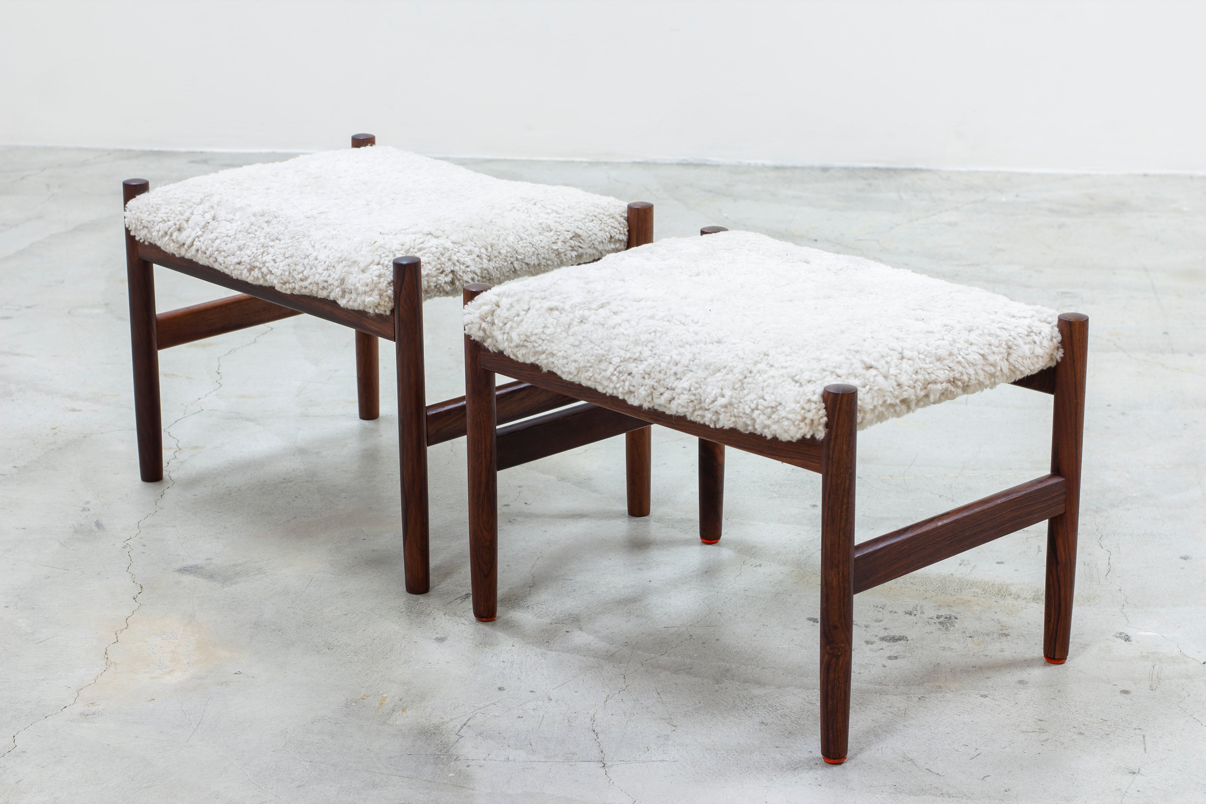 Pair of stools with sheepskin by Hugo Frandsen