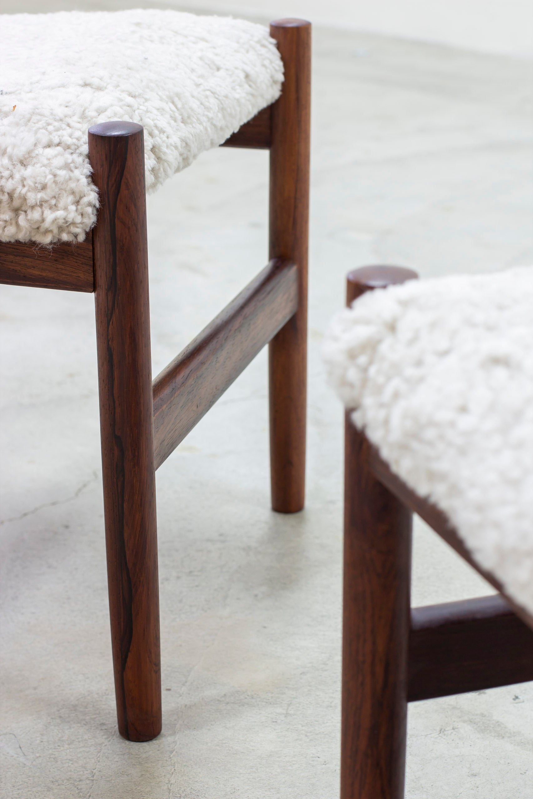 Pair of stools with sheepskin by Hugo Frandsen