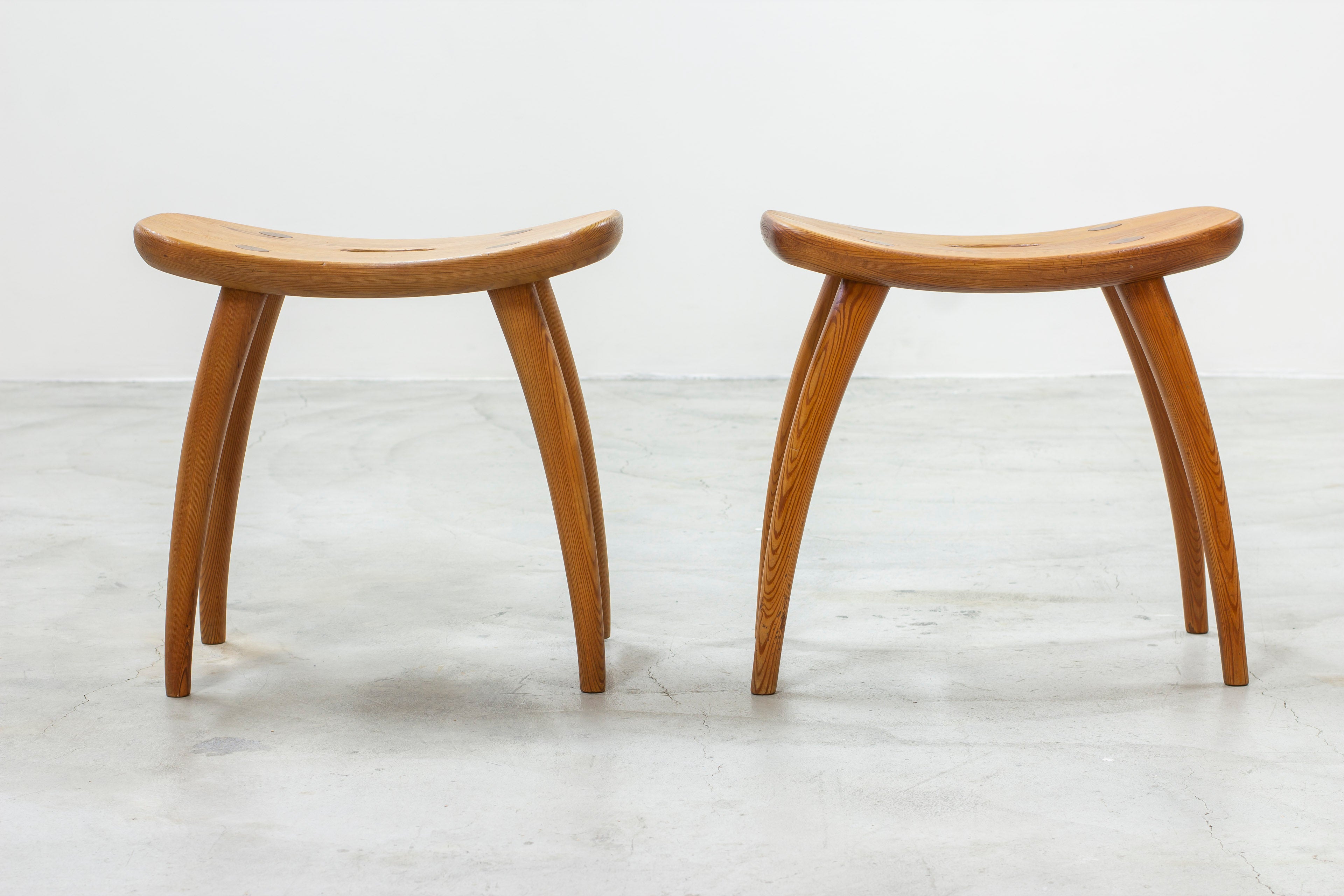 Pair of pine stools by Torsten Claesson