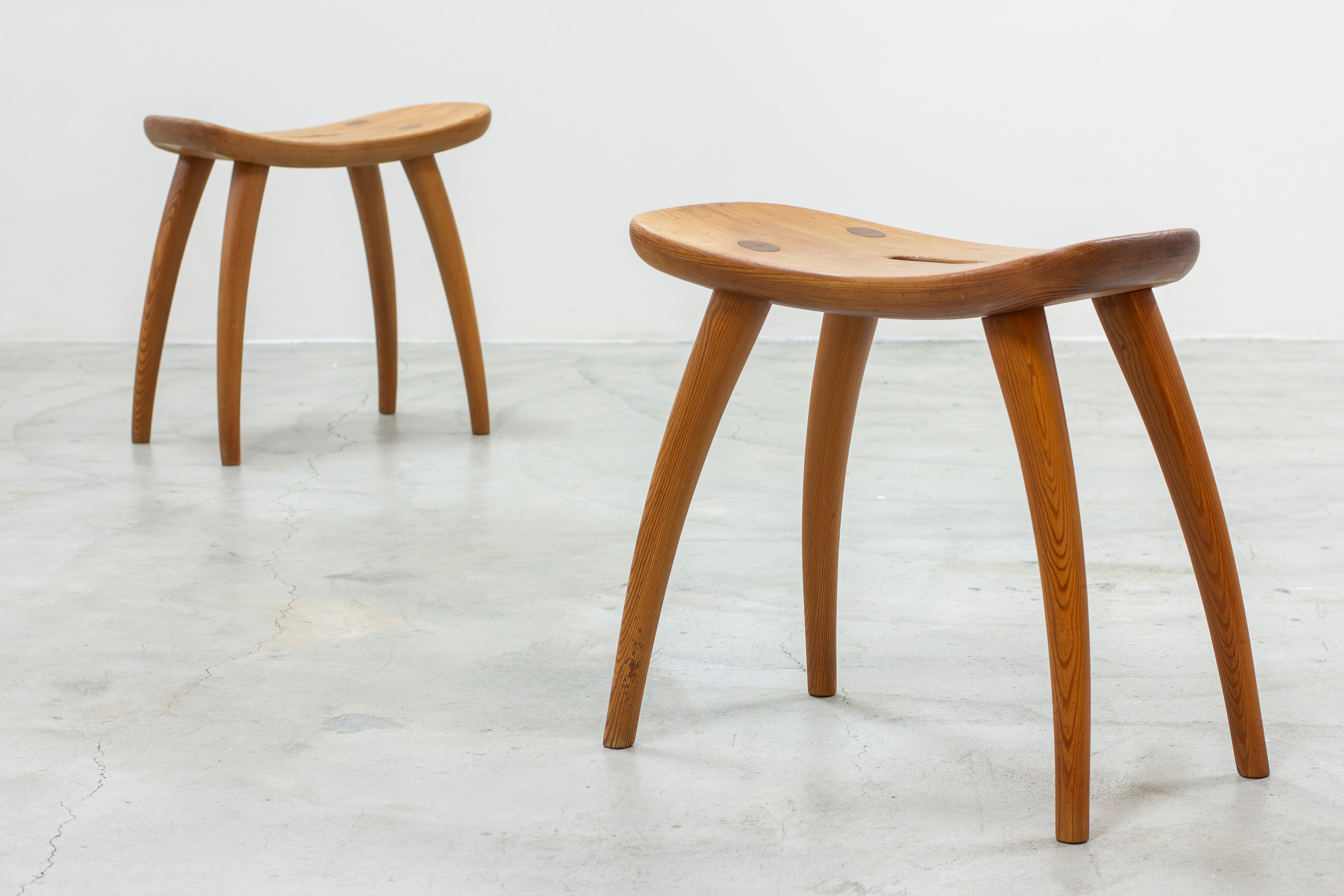 Pair of pine stools by Torsten Claesson