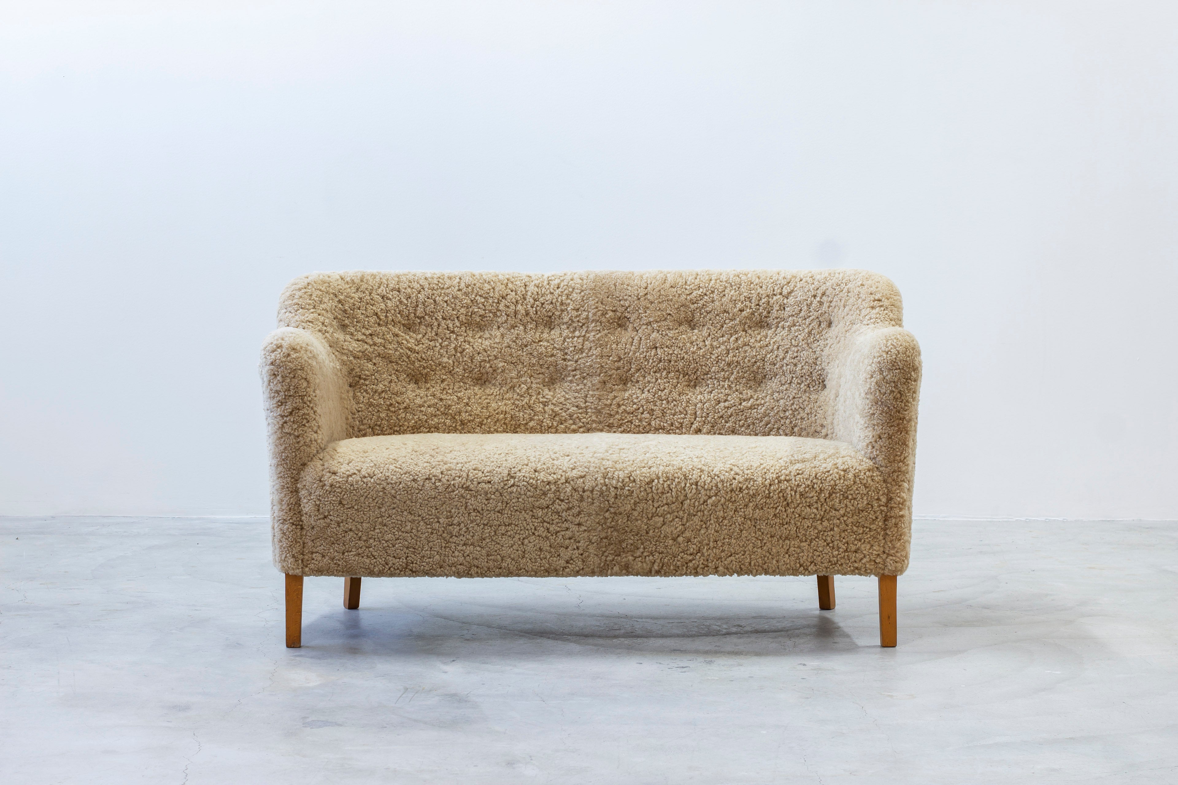 Sheepskin sofa by Edmund Jørgensen