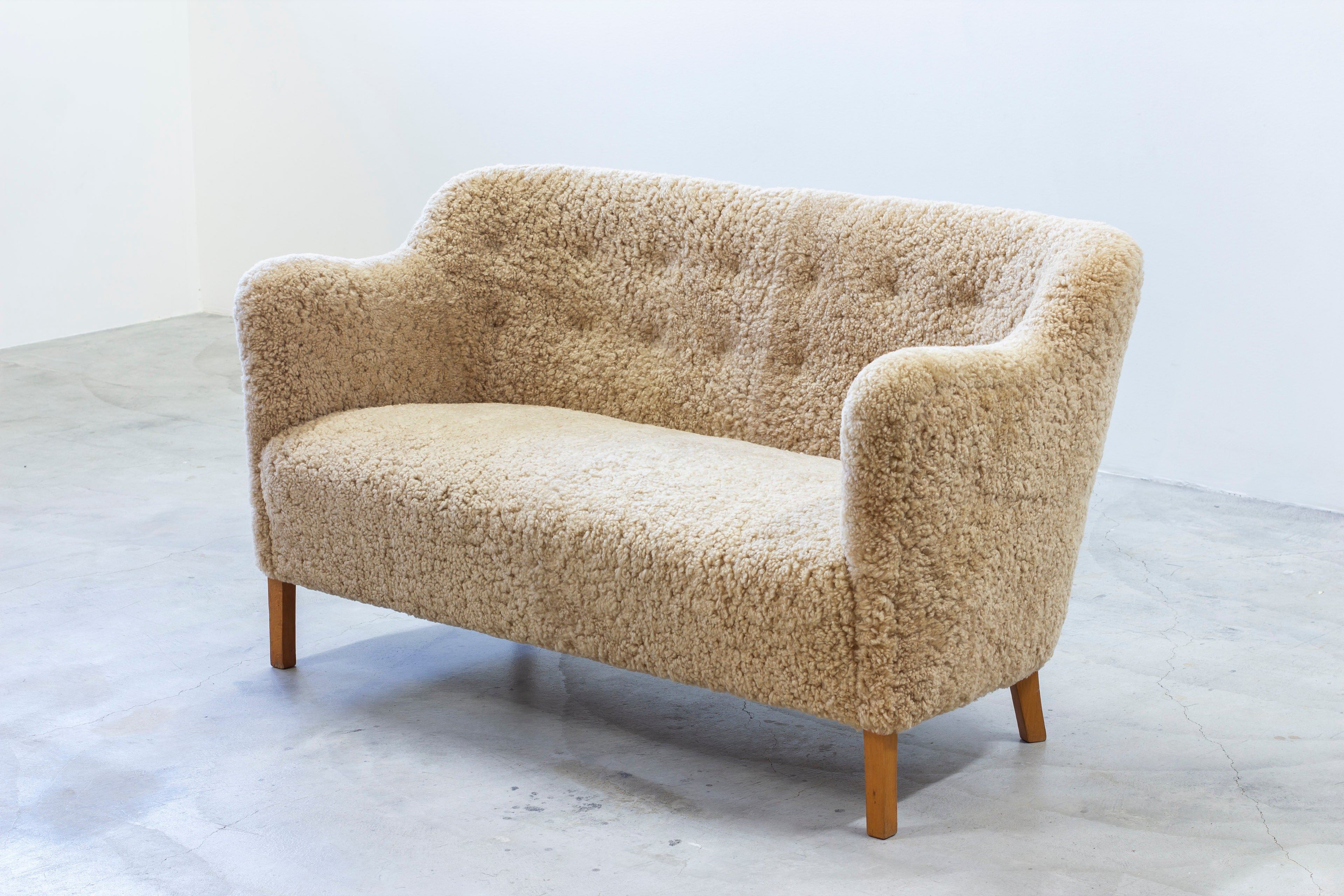 Sheepskin sofa by Edmund Jørgensen