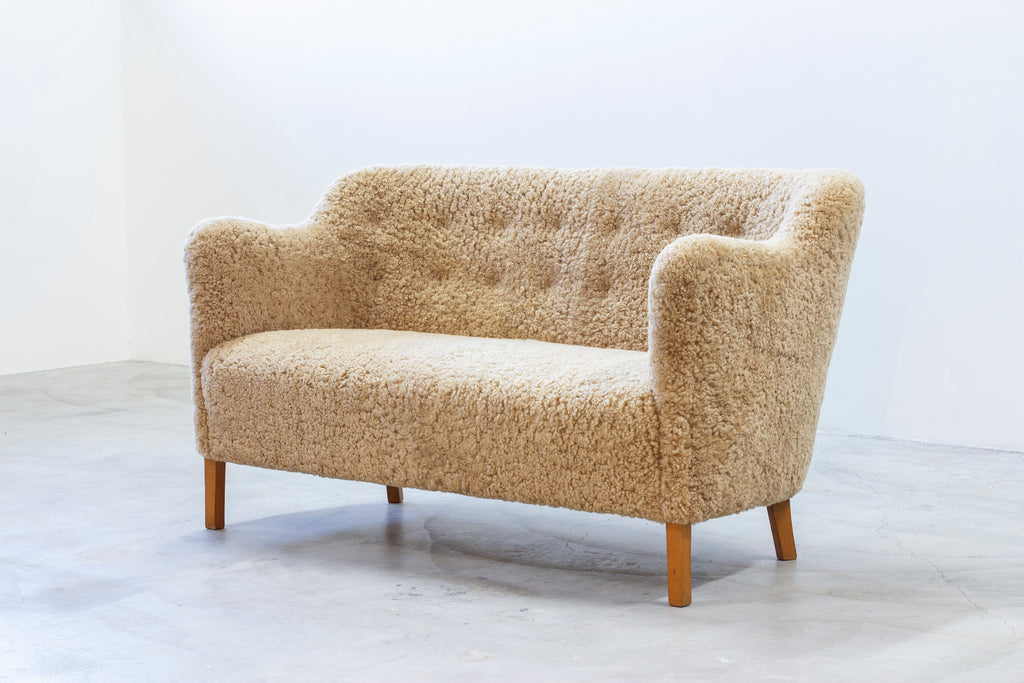 Sheepskin sofa by Edmund Jørgensen