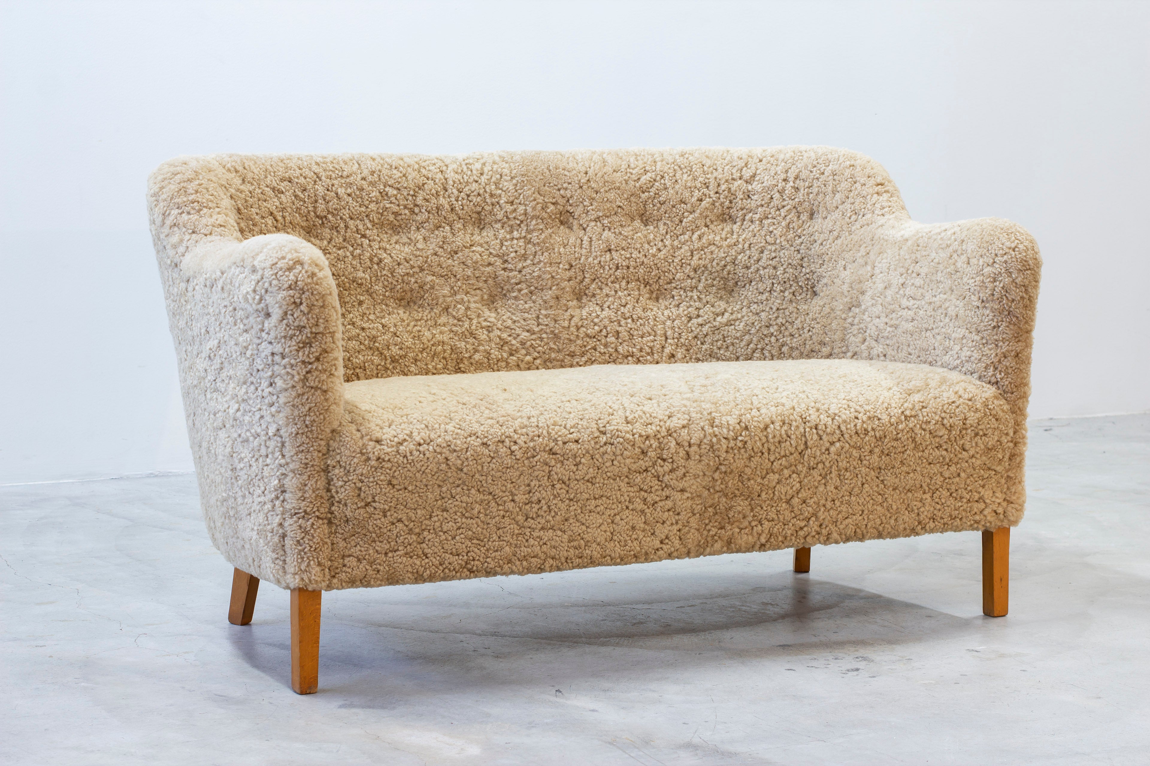 Sheepskin sofa by Edmund Jørgensen