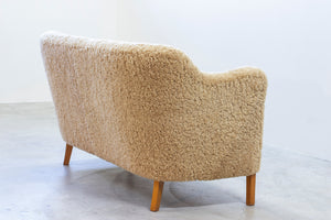 Sheepskin sofa by Edmund Jørgensen