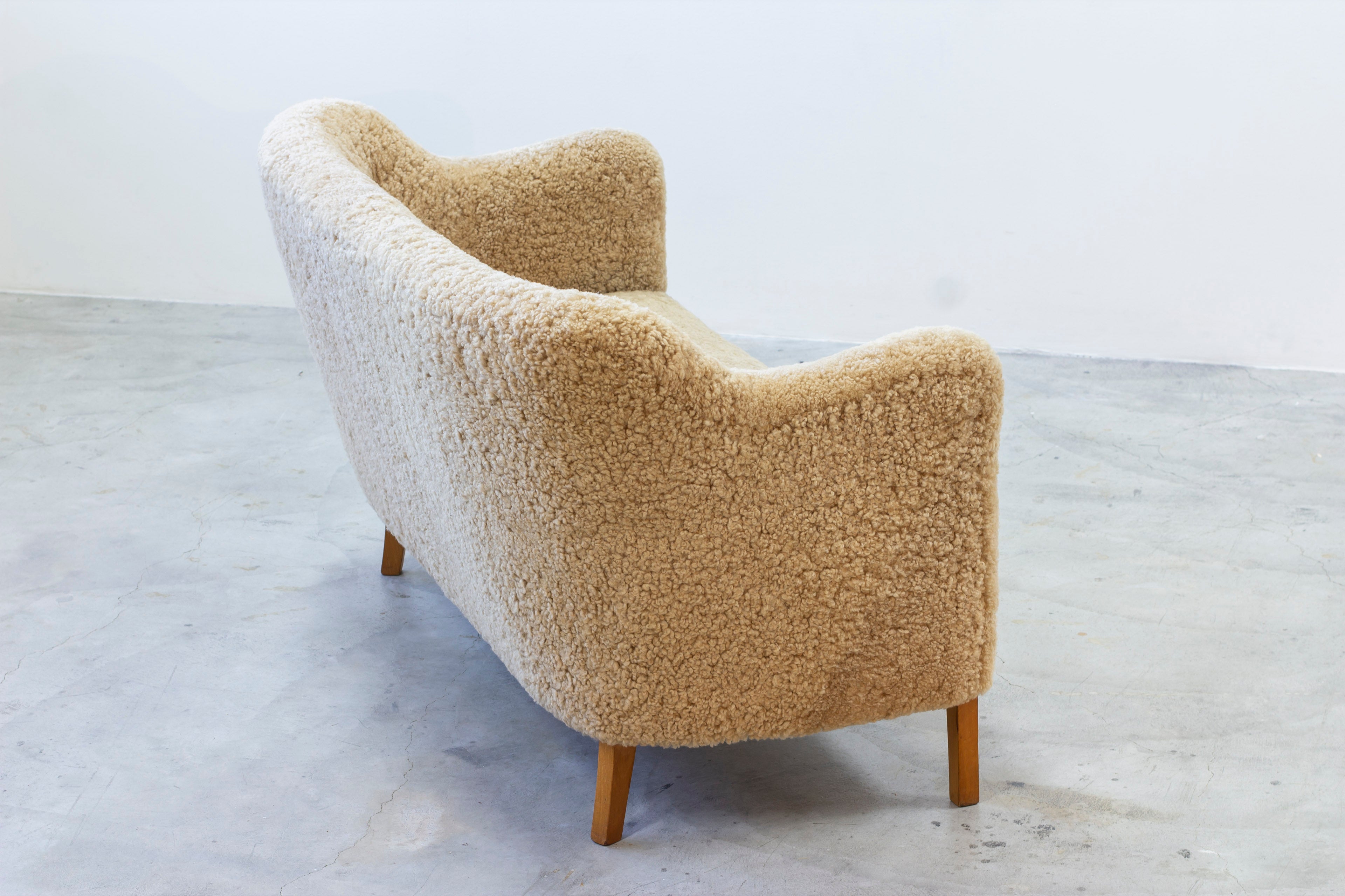 Sheepskin sofa by Edmund Jørgensen