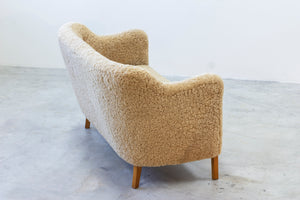 Sheepskin sofa by Edmund Jørgensen