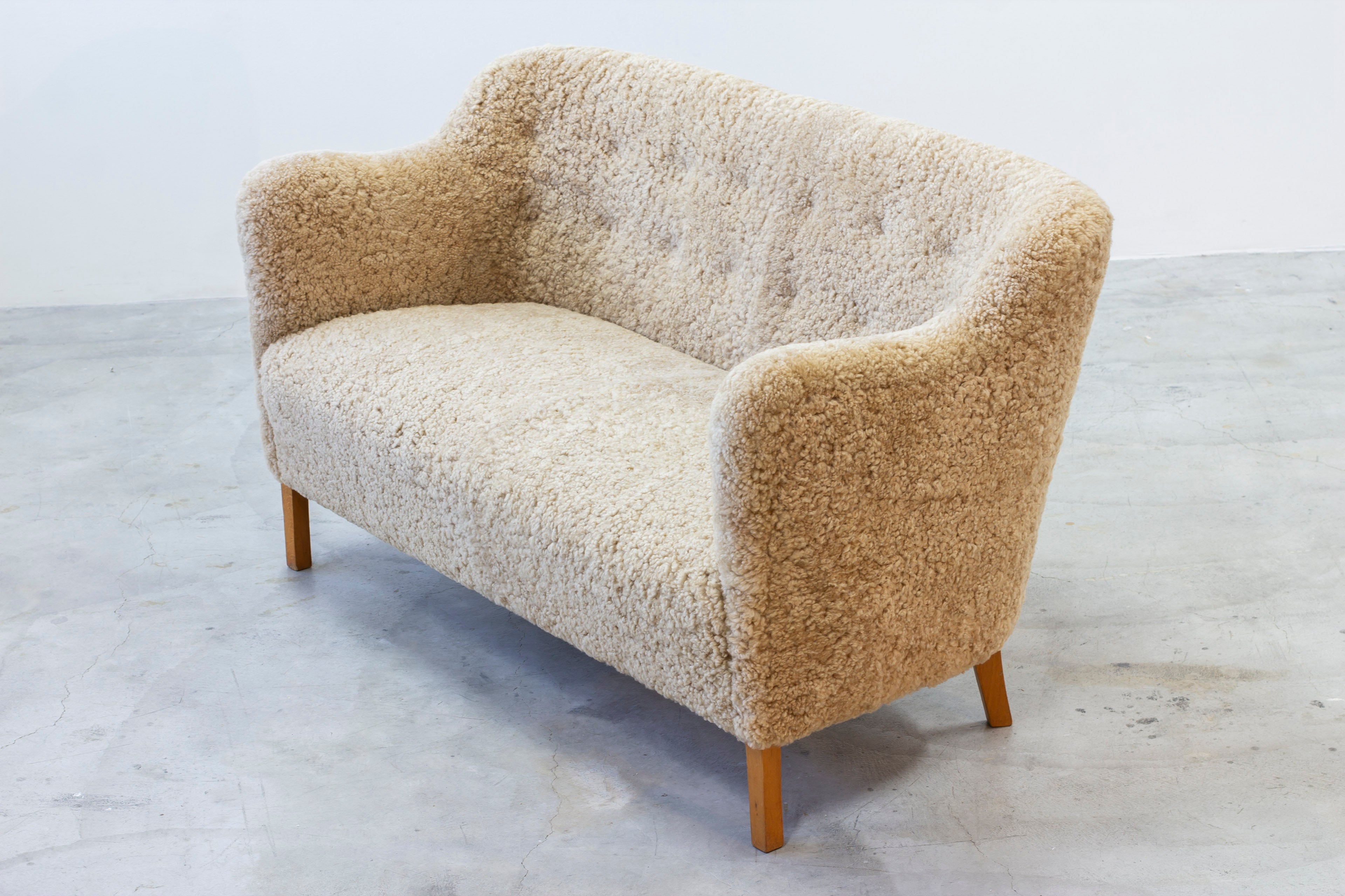 Sheepskin sofa by Edmund Jørgensen