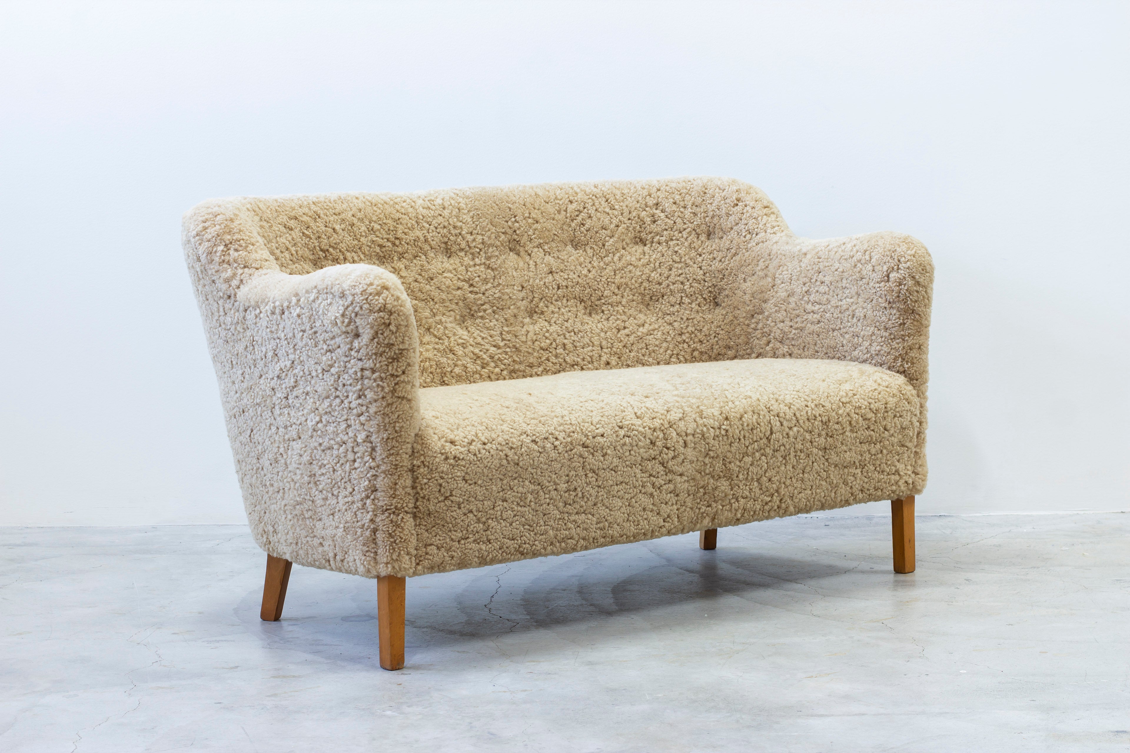 Sheepskin sofa by Edmund Jørgensen